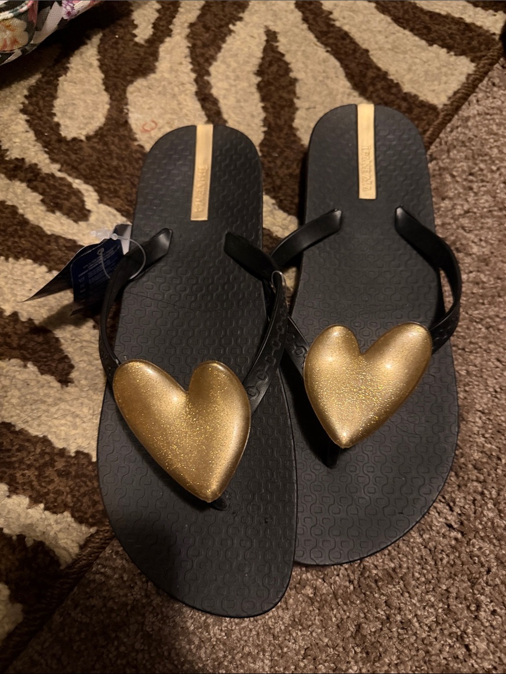 Black Flip Flops with Gold Heart Accents 9